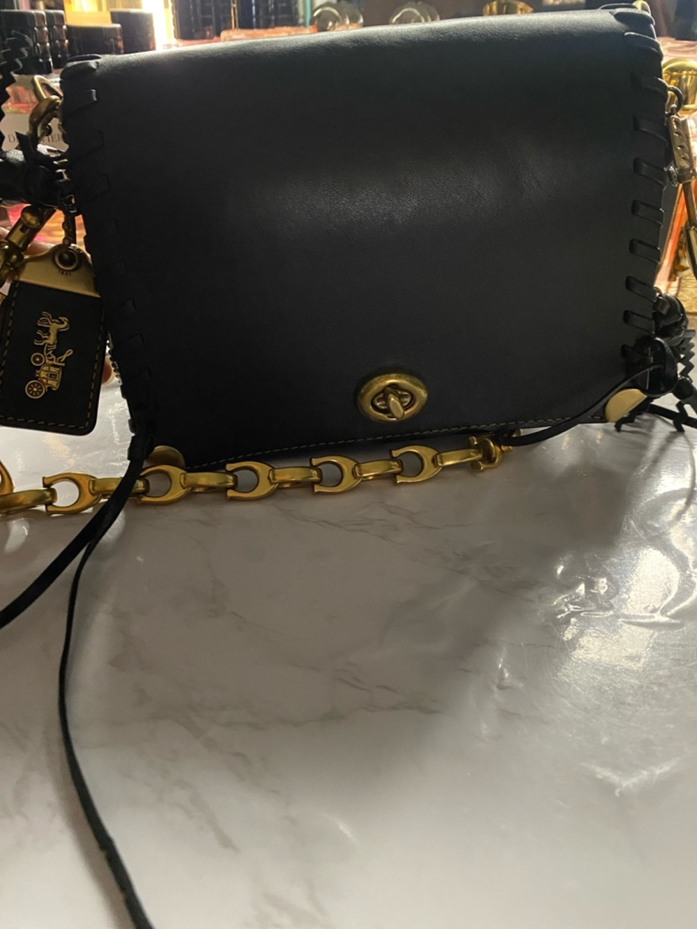 Coach Black Leather Crossbody with Gold Chain Strap and Tassel Charms